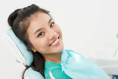 patient smiling during her visit to Pendleton Smiles