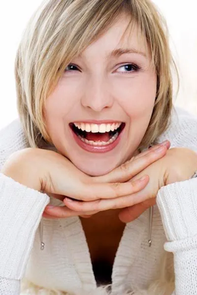 woman smiling after dental care at Pendleton Smiles