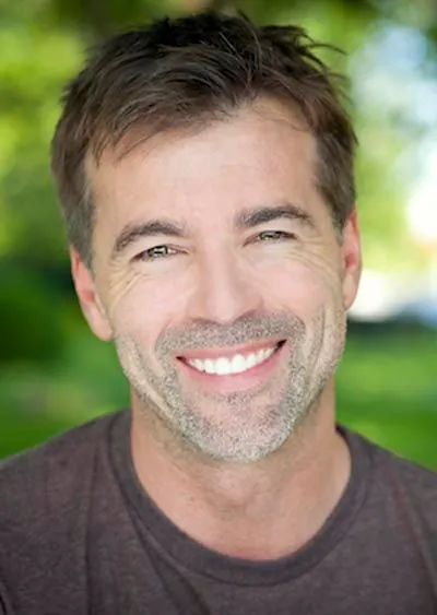 man smiling after restorative care at Pendleton Smiles